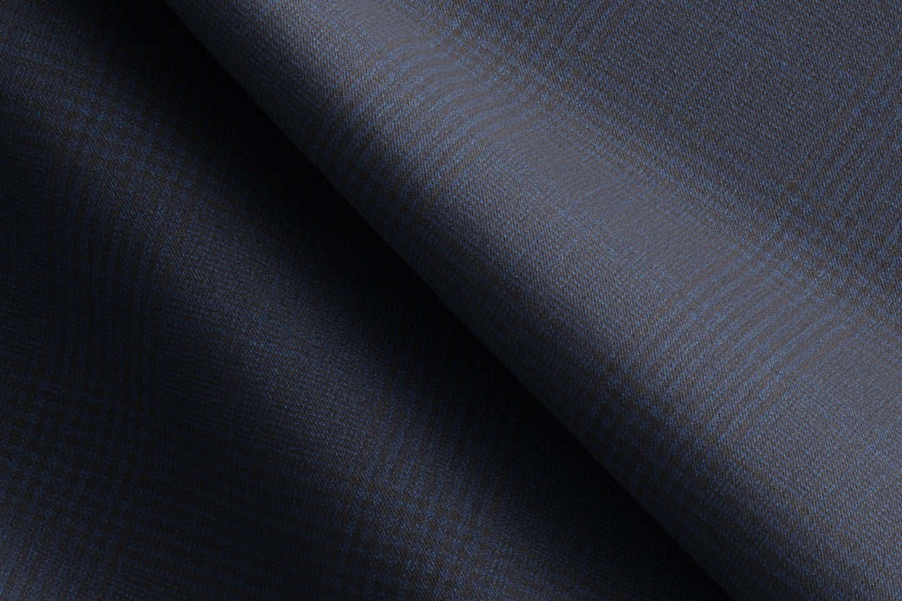 Bespoke 130s Prince of Wales wool trousers in blue Caccioppoli