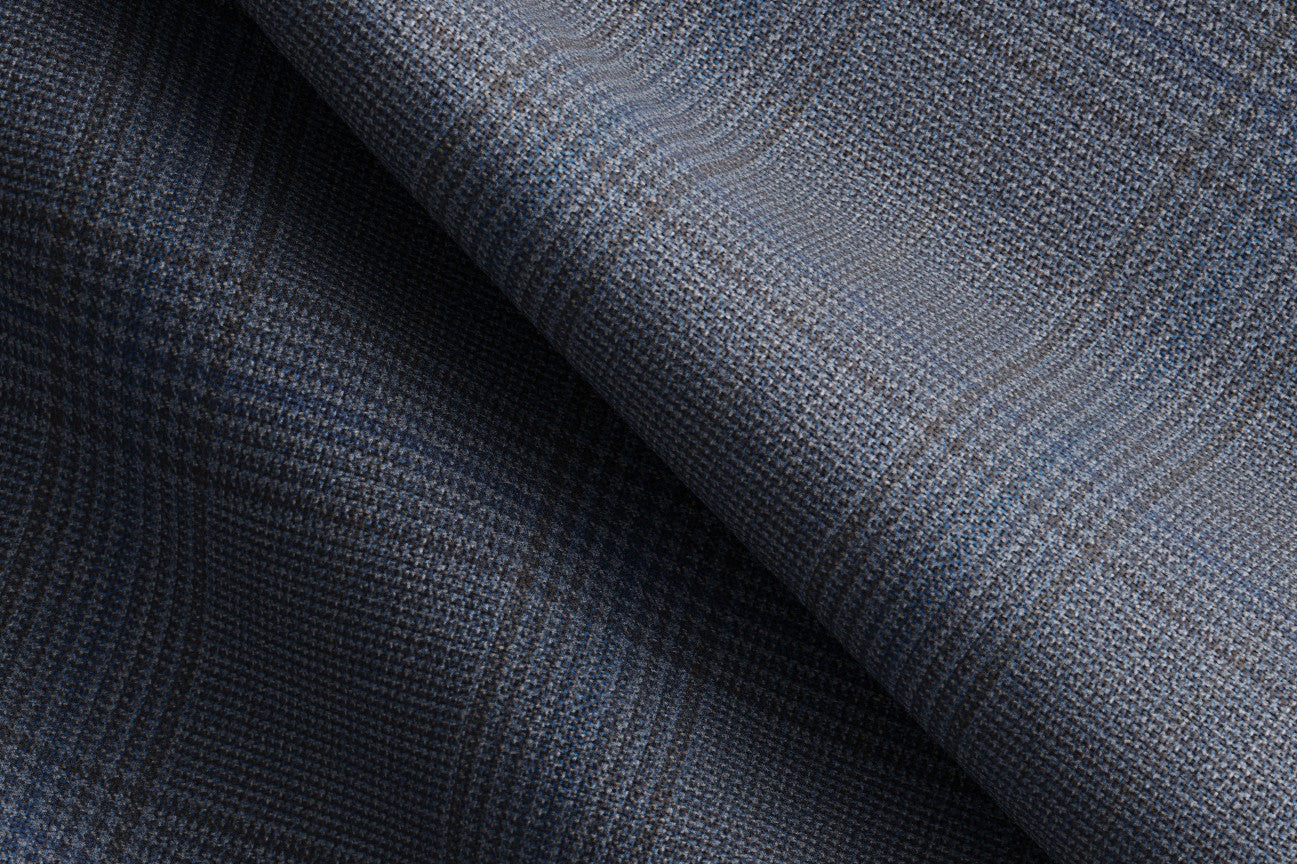 Made-to-measure 130s Prince of Wales wool trousers in light blue Caccioppoli